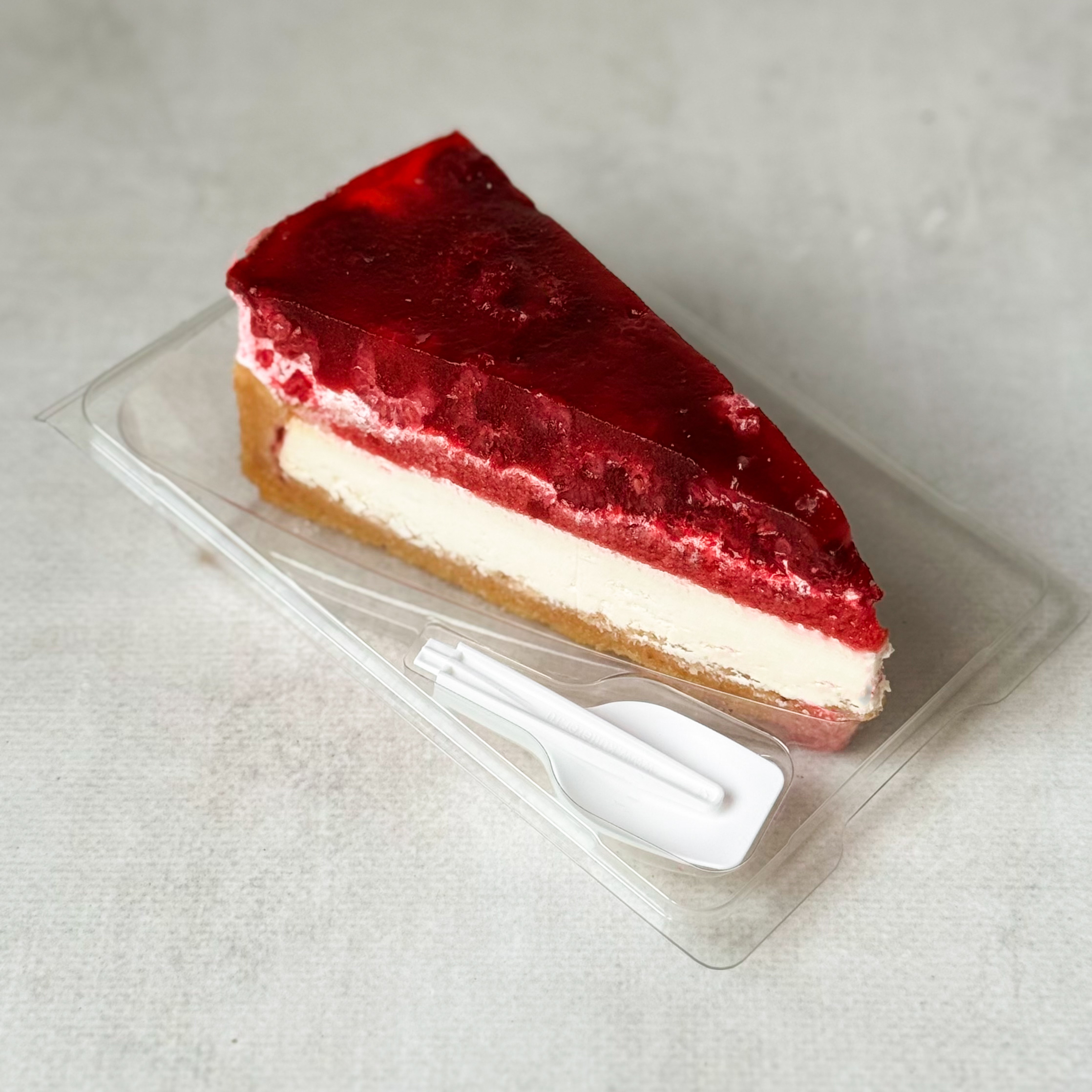 Нежнейший чизкейк из творожного сыра на сливочно-песочном корже, усыпанный ягодами свежей малины в желе. изображение 4