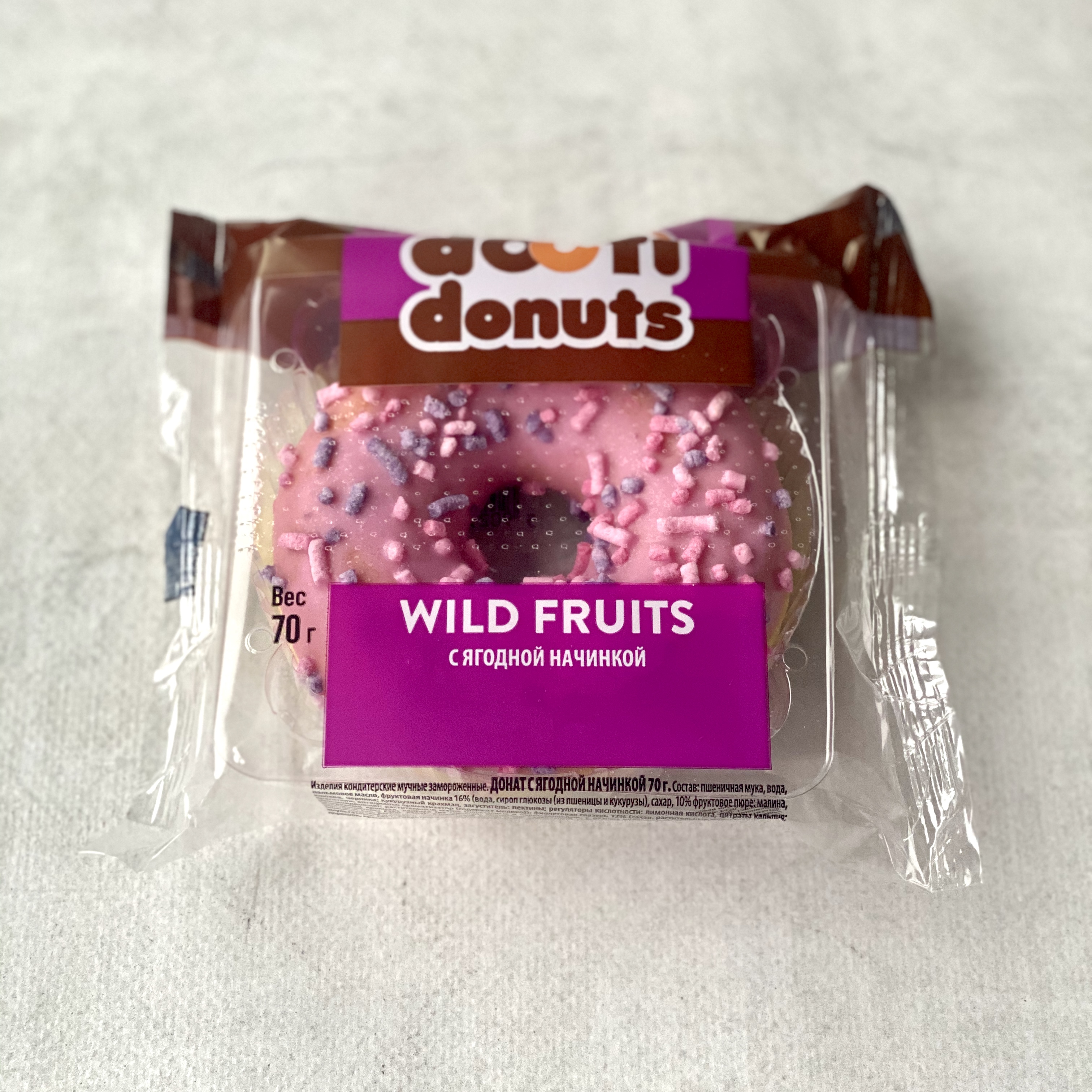 Пончик с начинкой из пюре малины, клюквы, черники с розовой глазурью и розовой посыпкой изображение 1