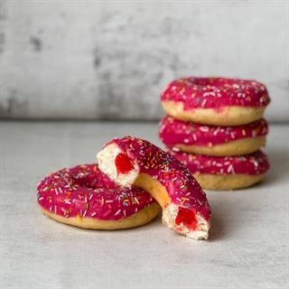 Донат глазированный клубничный с клубничной начинкой